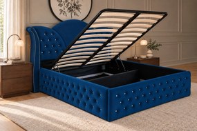 Pat tapițat Chesterfield din catifea Velora Deluxe 160×200 cm, bleumarin, cu ladă de depozitare