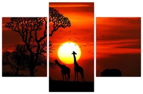 Tablou - Siluete animalelor la apus de soare (90x60 cm)