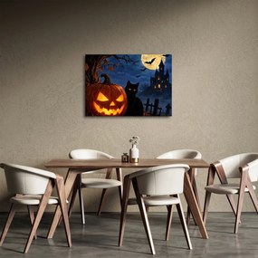 Tablou - Pisică neagră lângă un dovleac luminat de Halloween (70x50 cm)