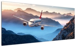 Tablou - Avion peste crestele montane (120x50 cm)