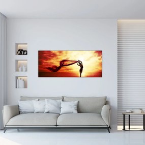 Tablou - Silueta femeii la apus de soare (120x50 cm)