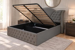 Pat tapițat Chesterfield din catifea Velora Cristal 140×200 cm, gri închis, cu ladă de depozitare