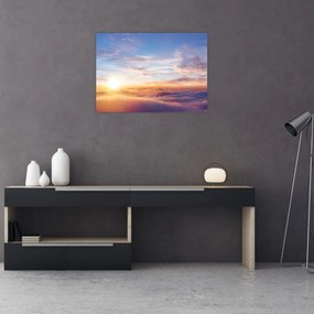 Tablou pe sticlă - Apus de soare deasupra norilor (70x50 cm)