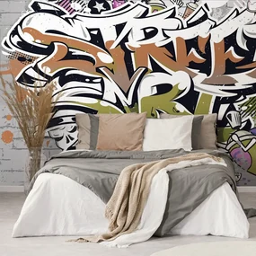 Tapet inscripție portocalie Street Art cu spray-uri
