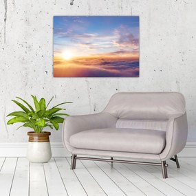 Tablou pe sticlă - Apus de soare deasupra norilor (70x50 cm)
