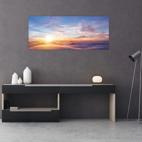 Tablou - Apus de soare deasupra norilor (120x50 cm)