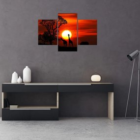 Tablou - Siluete animalelor la apus de soare (90x60 cm)