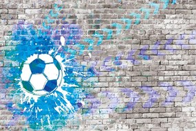 Tapet minge de fotbal albastră pe perete de cărămidă