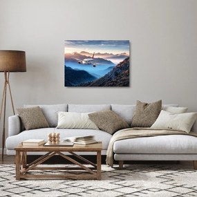 Tablou pe sticlă - Avion peste crestele montane (70x50 cm)
