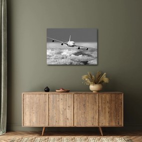 Tablou - Avion în nori, alb și negru (70x50 cm)