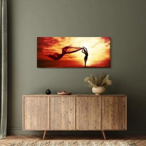 Tablou - Silueta femeii la apus de soare (120x50 cm)