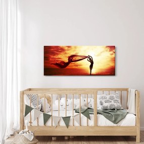 Tablou - Silueta femeii la apus de soare (120x50 cm)