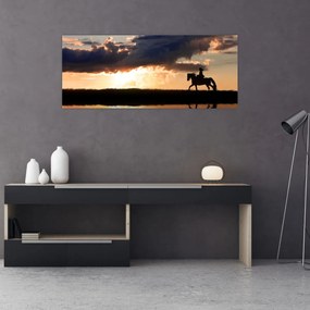 Tablou - Rider pe un cal la apus de soare (120x50 cm)