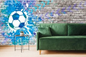 Tapet minge de fotbal albastră pe perete de cărămidă