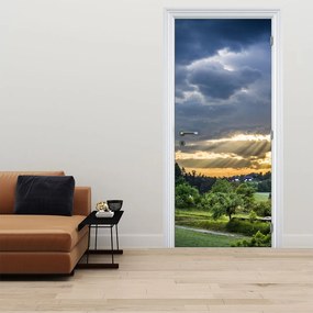 Fototapet pentru ușă - Peisaj cu razele solare (95x205cm)