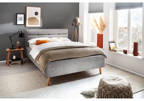 Pat matrimonial gri tapițat cu spațiu de depozitare cu somieră 140x200 cm Lotte – Meise Möbel