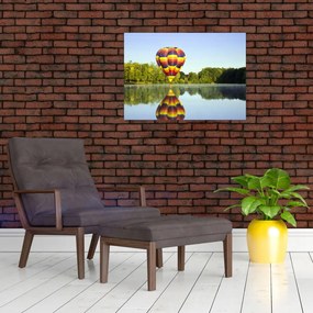 Tablou pe sticlă cu balon cu aer cald pe un lac (70x50 cm)
