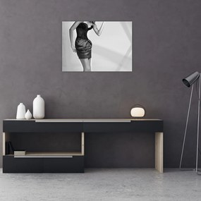 Tablou pe sticlă - Femeie într-o rochie scurtă (70x50 cm)