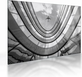 Tablou pe sticlă - Avionul deasupra clădirii (70x50 cm)
